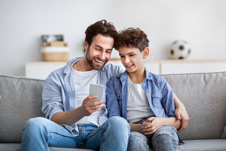 family-gadgets-concept-happy-father-showing-new-a-2021-09-02-07-18-09-utc